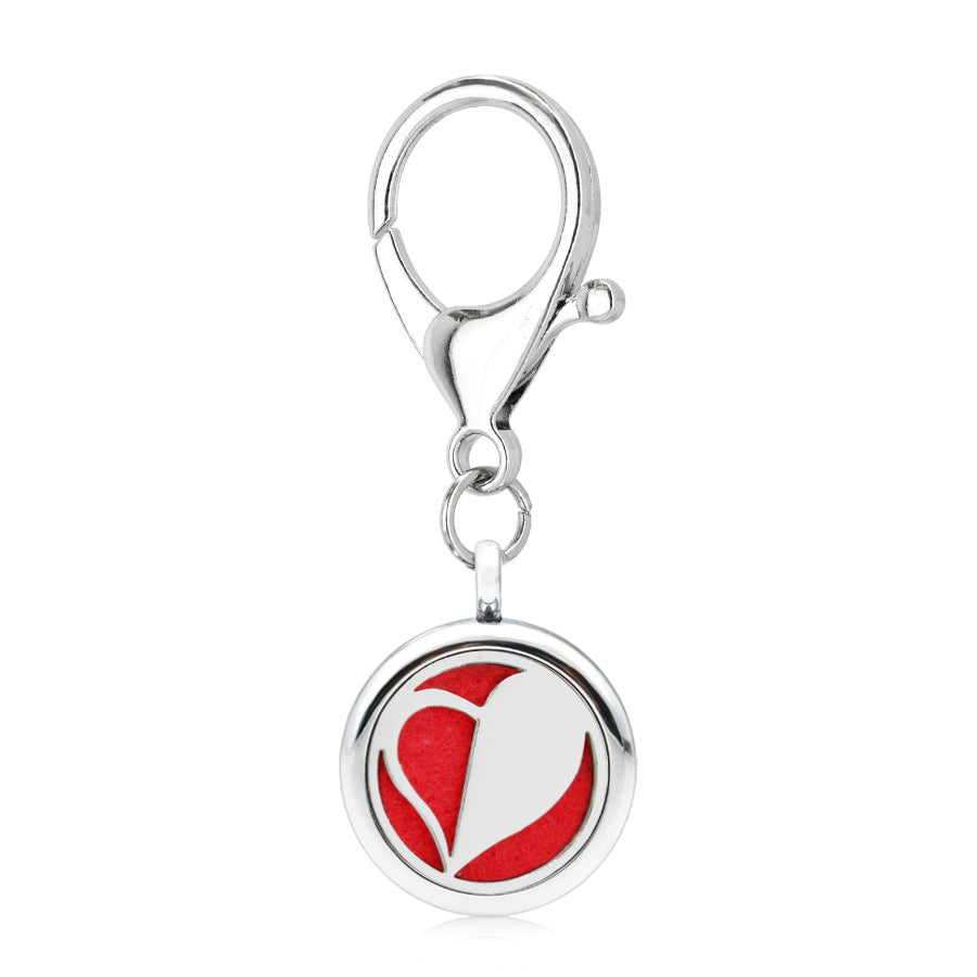 Wholesale Alloy 25MM Tree of Life Pink Ribbon Hollow Aromatherapy Essential Oil Keychain